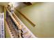 Stairway with lift and carpeted steps with wooden railing at 14200 W 86Th Pl, Arvada, CO 80005