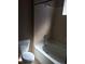 Well-maintained bathroom features tub, shower and tile surround at 1575 Olympia Cir # 208, Castle Rock, CO 80104