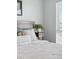 Bedroom with dark wood headboard and lush interior design at 1064 Depew St, Lakewood, CO 80214