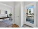 Bright entryway with a modern glass door and view of neighboring homes at 1064 Depew St, Lakewood, CO 80214