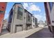 Modern townhouse exteriors featuring garages and contemporary design details at 1064 Depew St, Lakewood, CO 80214