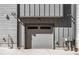 Single car garage door on a modern home at 1064 Depew St, Lakewood, CO 80214