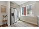 Contemporary kitchen with stainless steel refrigerator and plenty of natural light at 1064 Depew St, Lakewood, CO 80214