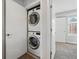 Convenient stacked washer and dryer unit in a modern closet at 1064 Depew St, Lakewood, CO 80214