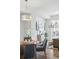 Living room with hardwood floors, a large window, and comfortable seating at 1064 Depew St, Lakewood, CO 80214