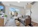 Spacious living room with a sliding glass door to the balcony, providing great outdoor access and views at 1064 Depew St, Lakewood, CO 80214
