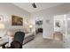 Bedroom featuring neutral paint, and view of walk-in closet and adjacent bathroom at 2500 E Cherry Creek South Dr # 313, Denver, CO 80209