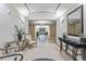 Elegant hallway with decorative tile flooring, high ceilings, stylish furnishings, and sophisticated lighting creates a grand entrance at 2500 E Cherry Creek South Dr # 313, Denver, CO 80209
