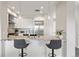 Stylish kitchen with stainless steel appliances, granite countertops, and pendant lighting over a breakfast bar at 2500 E Cherry Creek South Dr # 313, Denver, CO 80209