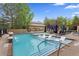 A beautiful pool with lounge chairs and umbrellas for guests to enjoy at 2500 E Cherry Creek South Dr # 313, Denver, CO 80209