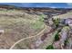 Picturesque backyard view featuring a trail and the natural landscape, highlighting the proximity to nature at 10459 Rivington Ct, Lone Tree, CO 80124
