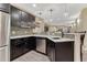 Basement featuring modern bar with granite countertops, sleek appliances, and pendant lighting at 10459 Rivington Ct, Lone Tree, CO 80124