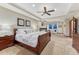 Spacious main bedroom features tray ceilings, a cozy fireplace, and sitting area at 10459 Rivington Ct, Lone Tree, CO 80124