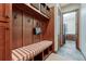Convenient mudroom with built in lockers, a bench and access to the laundry room at 10459 Rivington Ct, Lone Tree, CO 80124