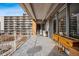 Outdoor balcony space with patio furniture and planters, offering views of the complex at 955 Eudora St # 307E, Denver, CO 80220