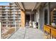 Outdoor balcony space with patio furniture offering views of the complex at 955 Eudora St # 307E, Denver, CO 80220
