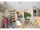 Cozy dining area with glass table, white chairs, and stylish décor at 955 Eudora St # 307E, Denver, CO 80220