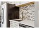 Bright kitchen featuring stainless steel appliances, modern cabinetry, and plenty of counter space at 955 Eudora St # 307E, Denver, CO 80220
