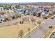 Aerial view of the community playground featuring mature landscaping and surrounding neighborhood at 8065 E 21St Ave, Denver, CO 80238