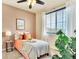 Cozy bedroom featuring warm tones, soft lighting, and a comfortable bed for a relaxing and peaceful environment at 8065 E 21St Ave, Denver, CO 80238