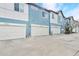 Modern townhomes with attached garages provide convenient and secure parking at 8065 E 21St Ave, Denver, CO 80238