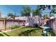 The backyard features a lush green lawn and a garden area, ideal for outdoor living at 126 S Clarkson St, Denver, CO 80209