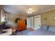 Comfortable bedroom with hardwood floors, ceiling fan, and lots of natural light at 126 S Clarkson St, Denver, CO 80209