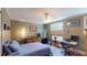 Inviting bedroom with natural light, and dedicated desk and seating areas at 126 S Clarkson St, Denver, CO 80209