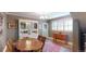 Bright dining room featuring a decorative hutch and wooden floors at 126 S Clarkson St, Denver, CO 80209
