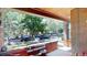 Inviting covered front porch offering a relaxing view of the tree-lined street and neighborhood at 126 S Clarkson St, Denver, CO 80209