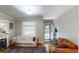 Inviting living room with a fireplace and lots of natural light at 126 S Clarkson St, Denver, CO 80209