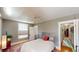 Serene main bedroom with ample light, ceiling fan, closet, and hardwood floors at 126 S Clarkson St, Denver, CO 80209