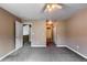 Spacious bedroom boasts neutral tones, soft carpet, and easy access to the bathroom and hallway at 1419 Red Mountain Dr # 126, Longmont, CO 80504