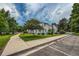 Charming townhouse with well-maintained landscaping, a sidewalk, and convenient parking at 1419 Red Mountain Dr # 126, Longmont, CO 80504