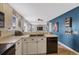 Open kitchen and living room concept with open breakfast bar and plenty of light at 600 Balsa Dr, Castle Rock, CO 80104