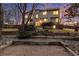 Landscaped backyard with stone design and multi-tiered planting beds at 7636 S Allison Ct, Littleton, CO 80128