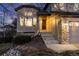 Charming front entrance with stone accents and well-maintained landscaping at 7636 S Allison Ct, Littleton, CO 80128