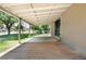The back of the home has a covered porch with wood flooring at 4300 Osage St, Denver, CO 80211