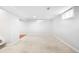 Spacious finished basement with new carpet, neutral paint, and natural light at 4300 Osage St, Denver, CO 80211