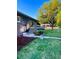 Charming home with a well-maintained front yard and mature tree at 4300 Osage St, Denver, CO 80211