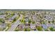 An aerial view of a neighborhood with houses neatly lined up along the streets and lush lawns at 5536 Kirk St, Denver, CO 80249