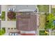 Aerial view displays the house, backyard deck, lawn, and neighboring properties in the area at 5536 Kirk St, Denver, CO 80249