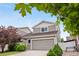 Charming two-story home featuring a spacious two-car garage and well-maintained landscaping at 5536 Kirk St, Denver, CO 80249