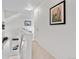 Upstairs hallway featuring white walls and neutral carpeting at 5536 Kirk St, Denver, CO 80249
