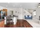 Inviting breakfast bar with a view into the living room and staircase at 5536 Kirk St, Denver, CO 80249