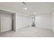 Finished basement with clean, white walls, modern flooring, closet and access to the unfinished area with laundry at 10723 Cherry Ct, Thornton, CO 80233