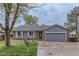 Charming single-Gathering home with a well-manicured lawn and an attached two-car garage at 10723 Cherry Ct, Thornton, CO 80233