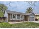 Charming single-Gathering home with a well-manicured lawn and an attached two-car garage at 10723 Cherry Ct, Thornton, CO 80233