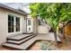 Inviting backyard with a spacious deck and mature landscaping, perfect for entertaining at 623 S Logan St, Denver, CO 80209