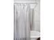 Elegant bathroom with a freestanding tub and stylish shower curtain, creating a spa-like atmosphere at 623 S Logan St, Denver, CO 80209